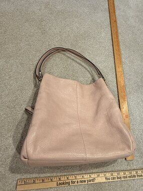 Coach Madison Phoebe handbag, featured in a soft blush pink pebbled leather